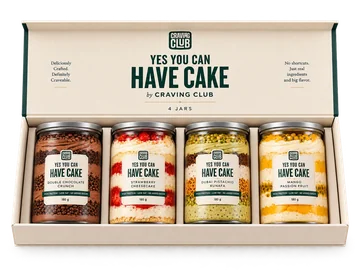 Open Craving Club box with four YES YOU CAN HAVE CAKE jars